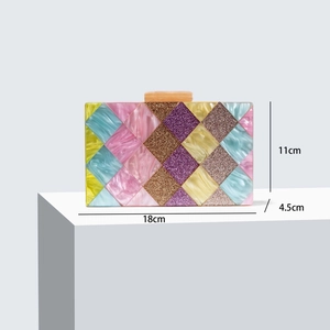 Detailed size view of colorful acrylic clutch bag with 18cm x 4.5cm x 11cm dimensions