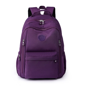 Waterproof dark purple nylon backpack with multiple compartments for casual travel and school
