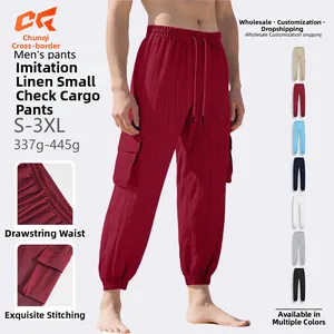 Detailed view of red cargo pants showing textured grid fabric and side flap pockets
