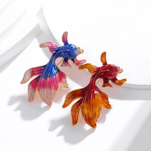 Minimalist Chinese style goldfish brooch set with colorful enamel detail and vibrant fins