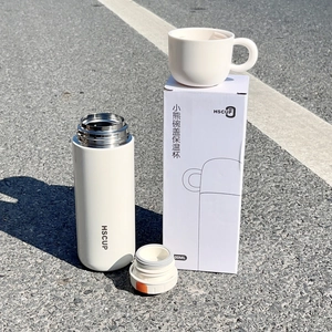Minimalist 500ml stainless steel vacuum flask set in cream white with bowl-shaped lid