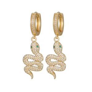 18k gold plated snake drop earrings with sparkling white zircons and green eyes