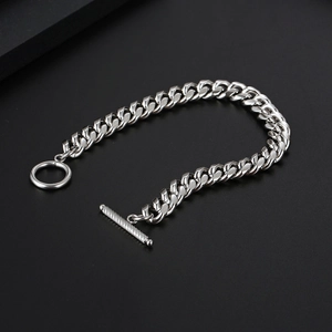 Sleek silver stainless steel Cuban chain bracelet with OT toggle clasp on black background
