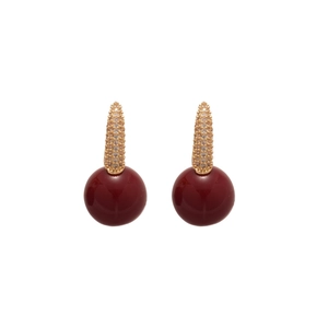 Elegant gold earrings featuring deep red resin beads and pavé zircon cone accents