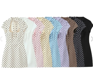Short sleeve polka dot dress with bow tie detail and cutout design in nine colors