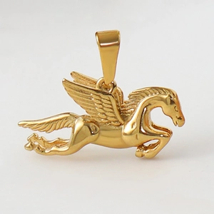 Polished 18k gold plated flying horse Pegasus pendant with metallic sheen on white background