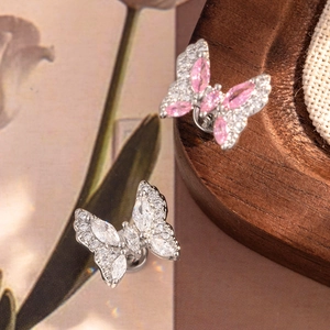 Boucles d'oreilles papillon en acier titane avec cristaux roses et blancs