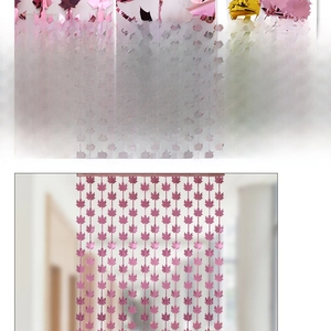 Detail of pink maple leaf fringe curtain showing laser-cut shapes and reinforced adhesive