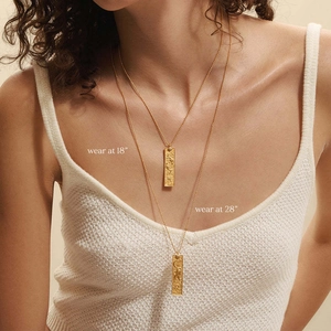 Detailed comparison of 18 and 28 inch 18K gold plated zodiac tarot necklace lengths on model