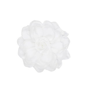 Detailed close-up of a white satin fabric camellia flower with layered 3D petals