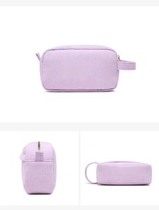 Detail view of purple corduroy cosmetic bag showing top and side angles with zipper