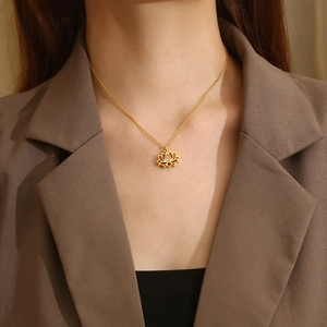 Stainless steel lotus necklace set with white zircon gemstone worn by a model
