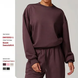 Sweatshirt Femme à Col Rond en Tissu Scuba Couleur Unie Coupe Ample Épaules Tombantes Manches Longues Pullover Décontracté