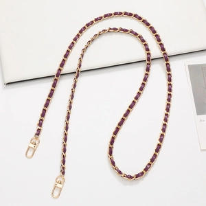Detail of purple leather woven gold metal chain strap with rotatable lobster clasps