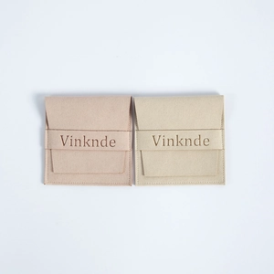 Pochettes à bijoux en suédine rose et beige avec ruban horizontal et logo Vinknde