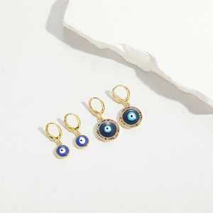 Minimalist evil eye drop earrings in gold with blue enamel and colorful zircon stones