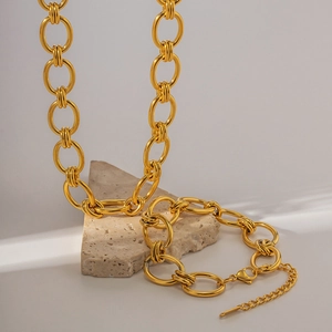 Parure de bijoux avec collier et bracelet en maille épaisse acier inoxydable plaqué or 18K