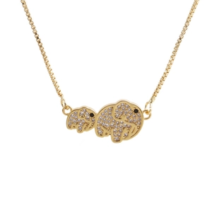 Minimalist gold elephant pendant necklace with shimmering zircon stones on white background