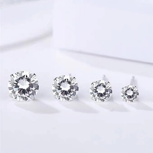Minimalist S999 sterling silver stud earrings with four-prong round zircon in four sizes