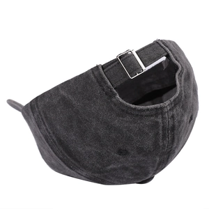 Washed dark grey baseball cap featuring adjustable metal buckle in back view