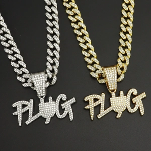 Iced out PLUG pendant necklaces in gold and silver finish with Cuban link chains