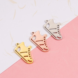 Set of three mirror-polished stainless steel hollow sneaker charms in gold, rose gold, and silver