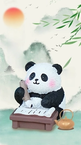 Close-up of cute resin panda figurine holding a brush with traditional desk and teapot