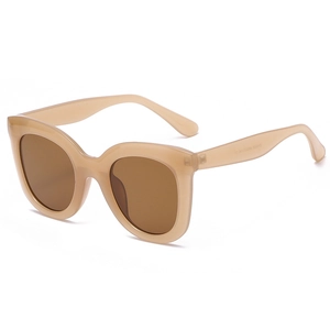 Fashionable oversized cat eye sunglasses in cream with dark brown lenses for women