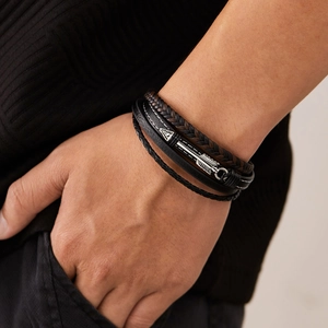 Multilayer men's vintage leather braided bracelet with a metal arrow clasp on wrist