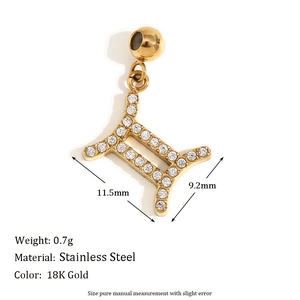 Minimalist 18K gold Gemini zodiac pendant with rhinestones on white background