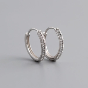 Detailed view of silver S925 hoop earrings with shimmering micro-pave white zircon stones