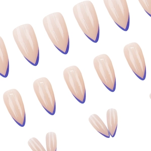 Glossy almond-shaped press-on nails with dark blue V-french tips on a nude pink base
