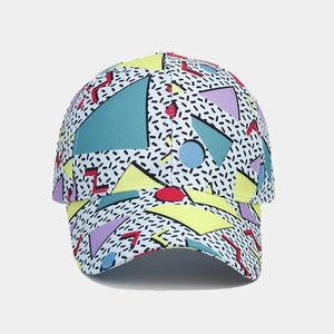 Detailed close-up of vibrant Memphis style geometric patterns on a cotton baseball cap