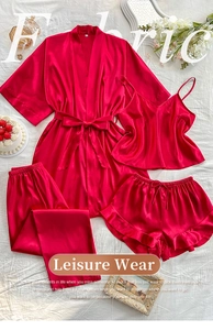 Detailed flat lay of red satin four-piece sleepwear set including robe and camisole