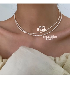 Close-up of double layer natural freshwater pearl necklace showing mini and rice pearl sizes