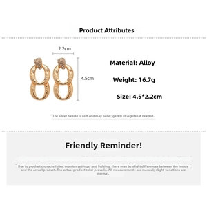 Detailed size view of gold layered oval drop earrings with zircon and silver pins