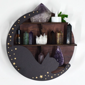 Detail of three-tier moon cat wooden shelf with gold stars for crystals and candles