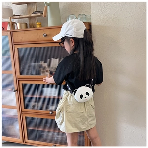 Detailed view of cute panda silicone crossbody bag with black straps for kids