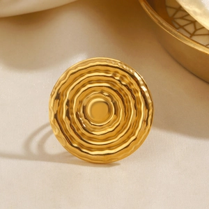 Golden stainless steel round ring featuring a unique water ripple textured surface