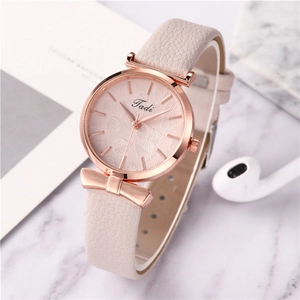 Montre à quartz rose pour femme avec cadran à motif feuille et nœud en or rose