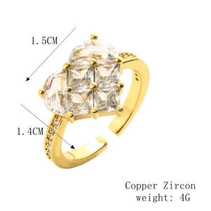 Detail view of gold-plated heart ring with zircon inlay showing 1.5cm x 1.4cm dimensions