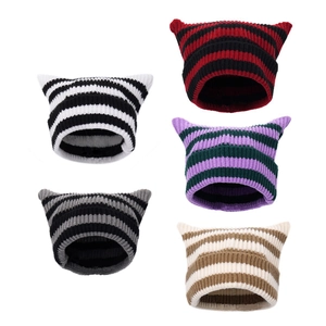 Detail showing five color variations of striped cat ear knit beanies in soft material