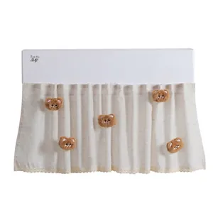 Beige air conditioner cover with cute plush bears and white lace trim detail