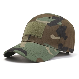 Close-up of tactical camo baseball cap showing ripstop fabric and front velcro patch area
