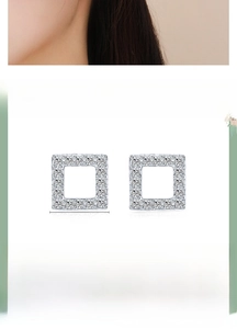 Macro detail of 7mm square 925 sterling silver stud earrings with cubic zirconia inlay