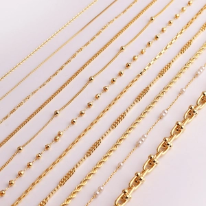 Various minimalist gold plated copper chains including ball, cable and twist link styles
