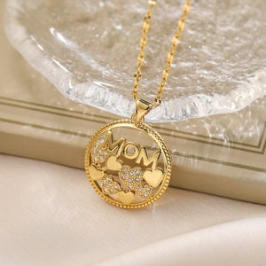 Gold plated MOM circle pendant necklace with sparkling cubic zirconia hearts on silk