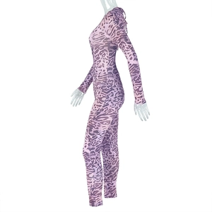 Detail of purple leopard print jumpsuit featuring long sleeves and slim fit fabric