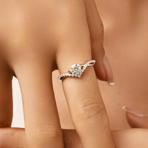 Elegant S925 sterling silver crown ring featuring a round moissanite and twisted band