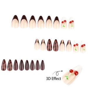 3D cherry press-on nails with tortoiseshell and French patterns on a white background